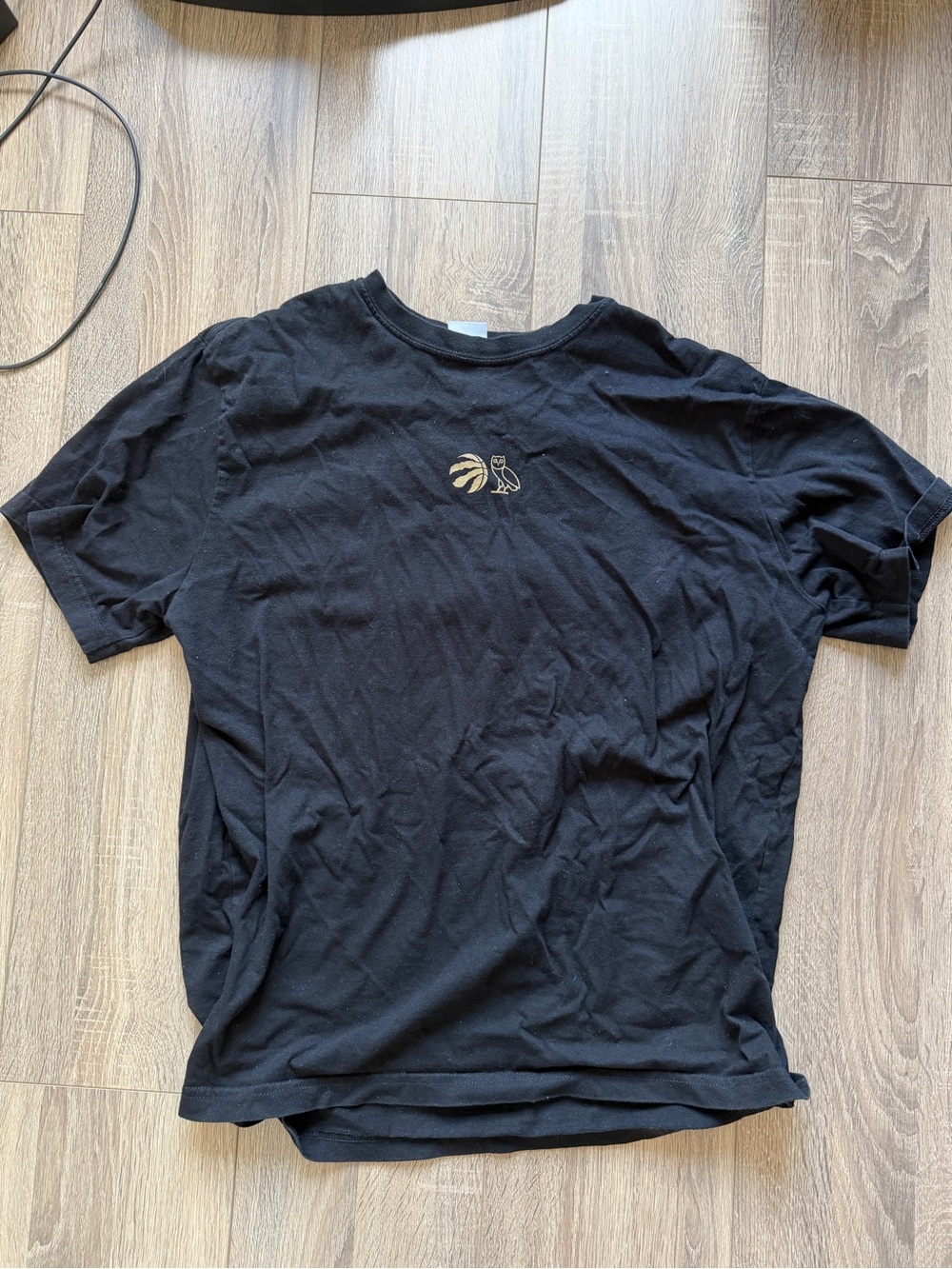 Men's Black Short Sleeve Tee with Small Gold Logo
